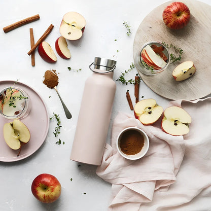 Black stainless steel water bottle showing 750ml capacity marking and measuring 24cm tall