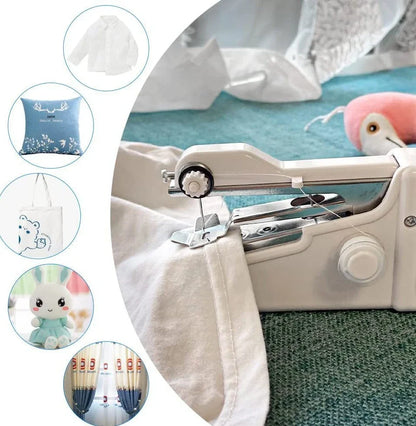 Black handheld electric sewing machine with ruler, scissors, and thread coils on white background