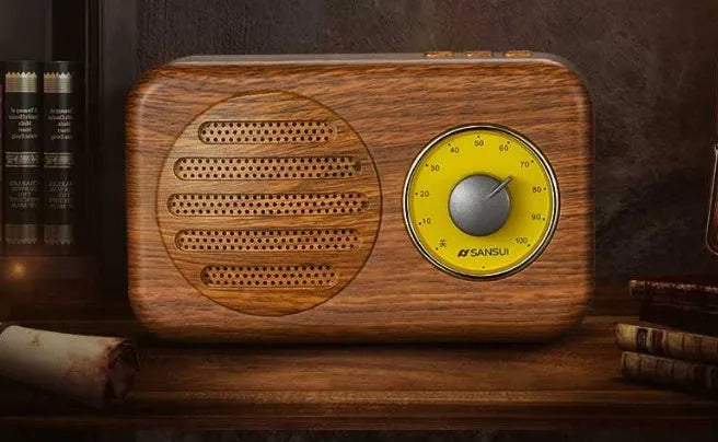 Portable Bluetooth wireless speaker with FM radio in wood grain finish