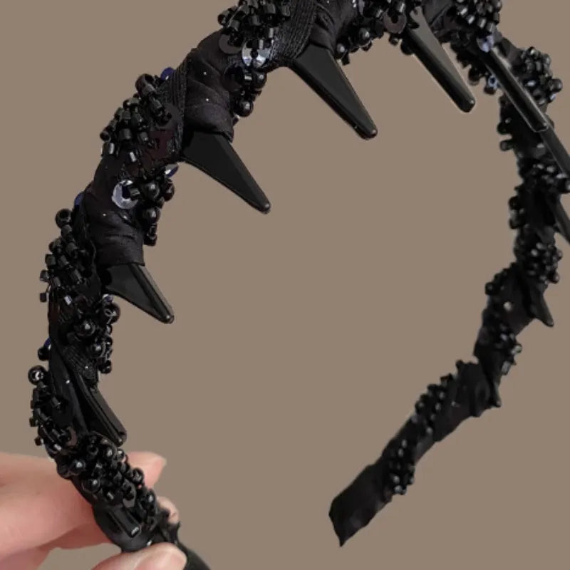 Velvet and crystal embellished high-head hairband in a choice of colours on a white background.