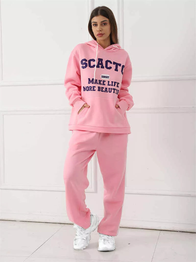 Women's casual printed top and pants set in polyester, available in black, pink, and purple