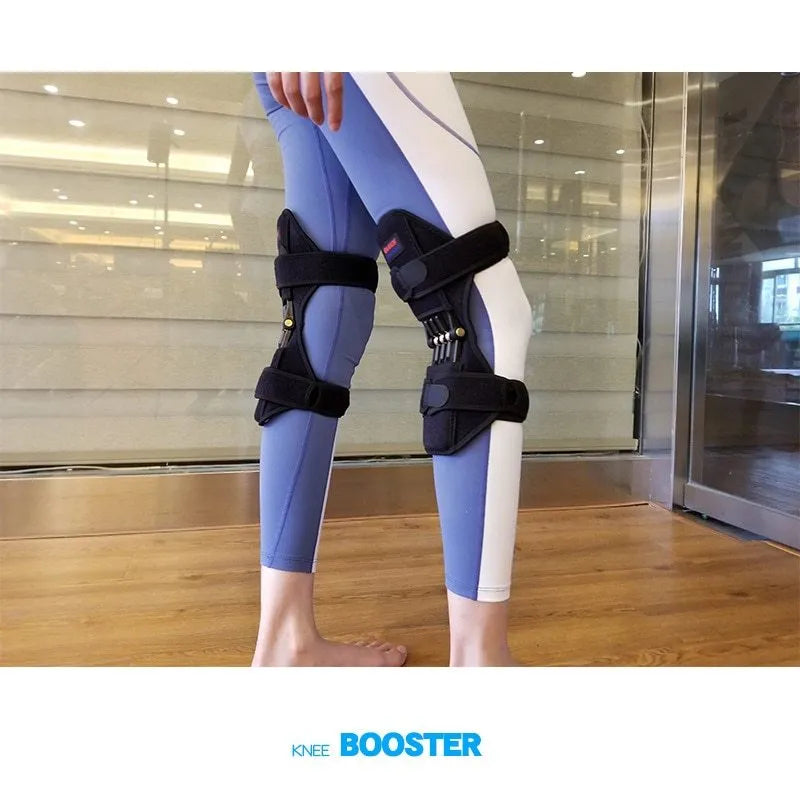Adjustable spring knee brace for sports support in black, shown with straps.
