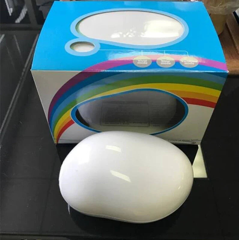 Colorful rainbow projection lamp with ABS plastic construction, offering soothing lighting effects for home decor