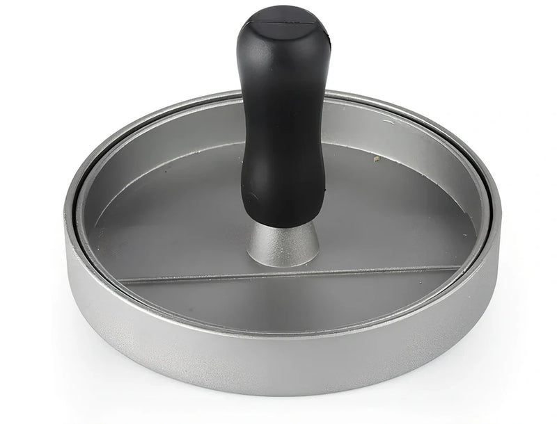 Single burger press with aluminium die-cast construction measuring 12x12x9cm, featuring a handled press plate and base for creating 1cm thick patties suitable for direct heating on various cooking surfaces