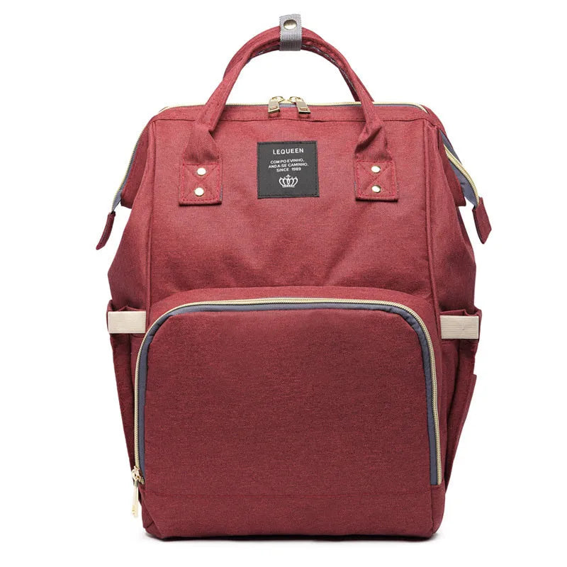 Oxford maternity nappy bag with 16-20L capacity, anti-theft design, bottle area, and multiple colour options