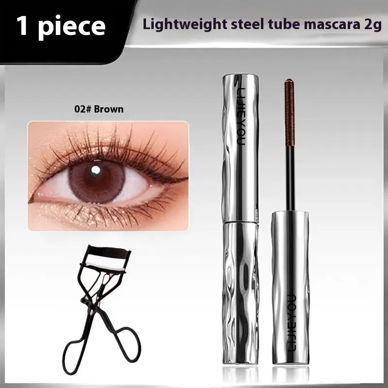Waterproof mascara in steel tube with optional eyelash curler in black and brown colours