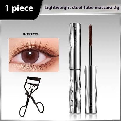 Waterproof mascara in steel tube with optional eyelash curler in black and brown colours