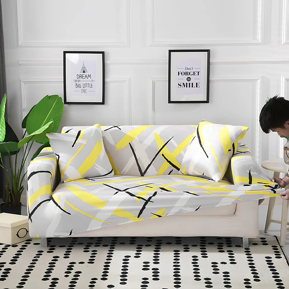 Printed geometric pattern sofa cover on double seat sofa measuring 145-185cm with spill protection