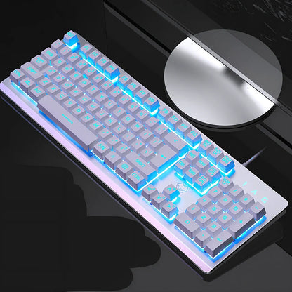 K002 metal gaming keyboard with rainbow backlighting and 104-key layout showing USB connection