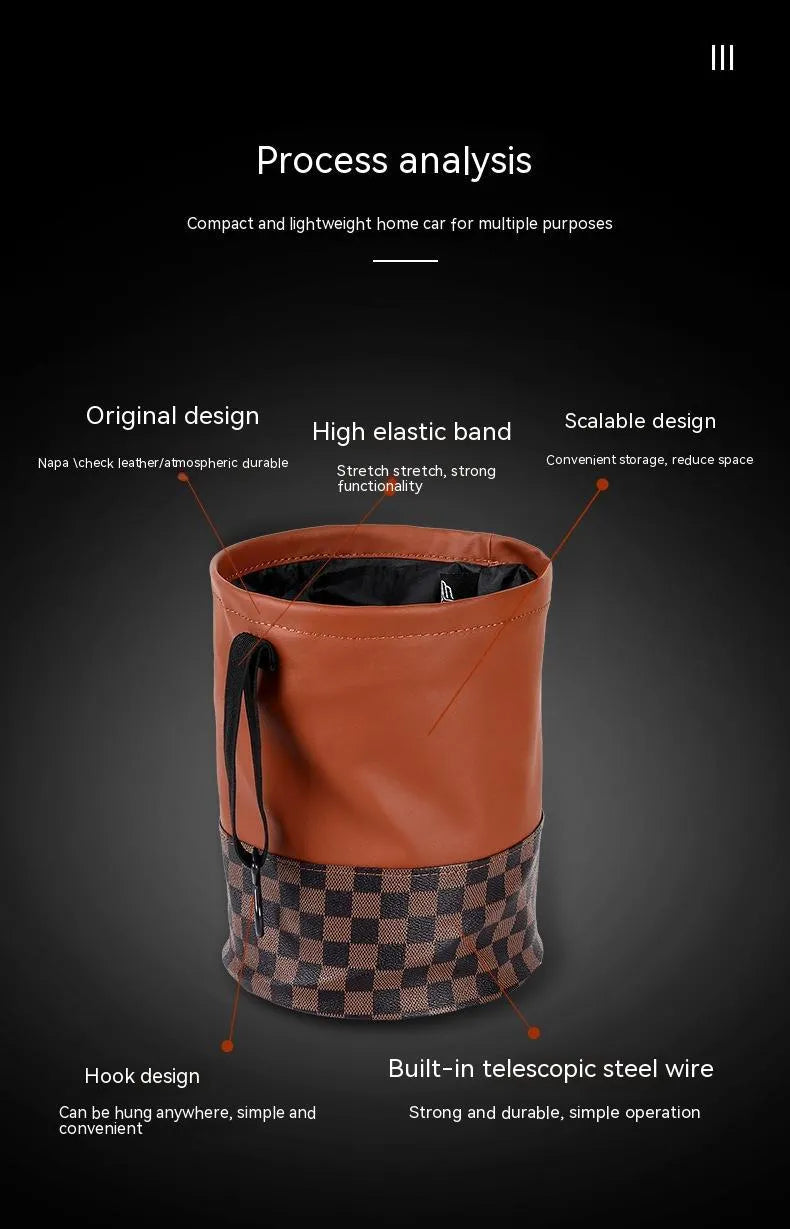 Black leather foldable car rubbish bin with a handle, shown empty.