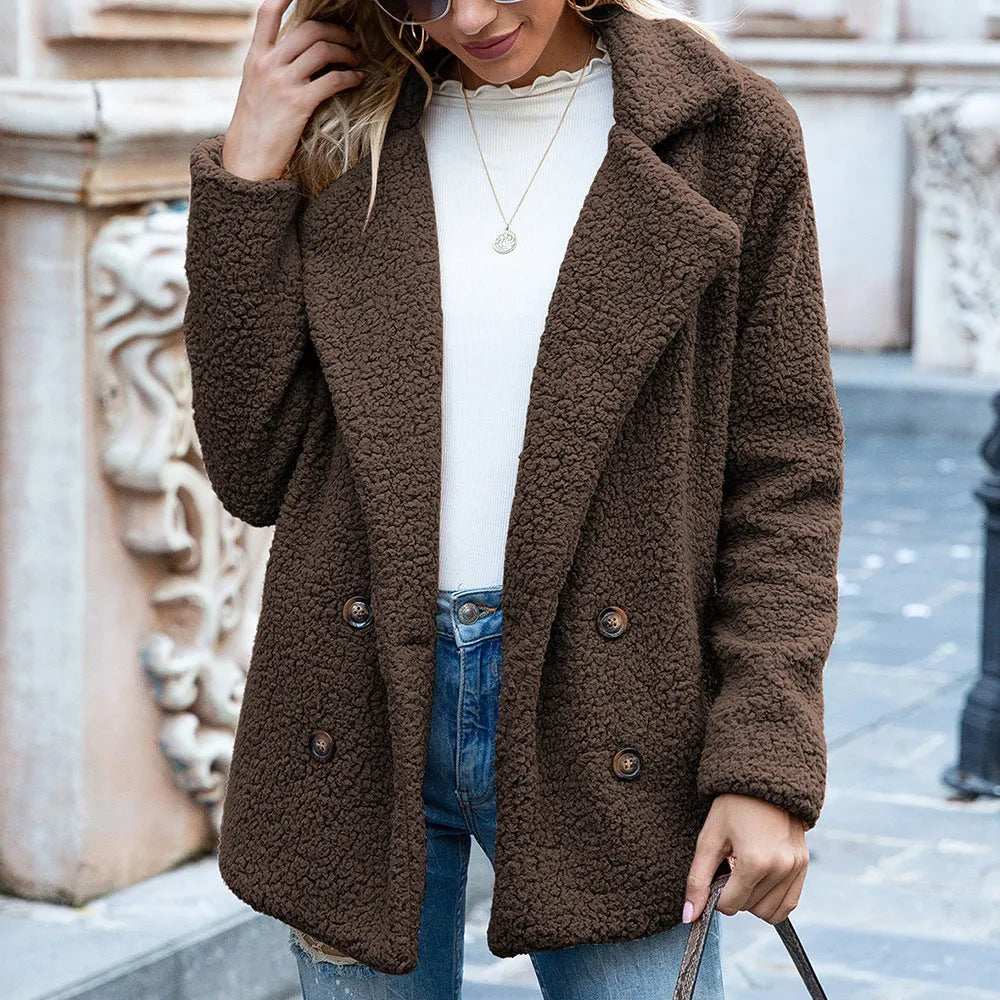 Women's fluffy polyester winter coat with loose lapel collar, shown in a choice of twelve colours.