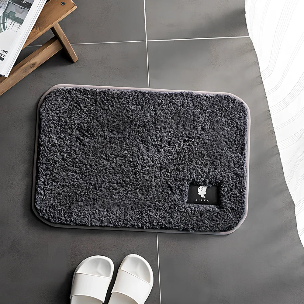 Rectangular polyester anti-slip mat in beige colour for bathroom use with non-woven construction
