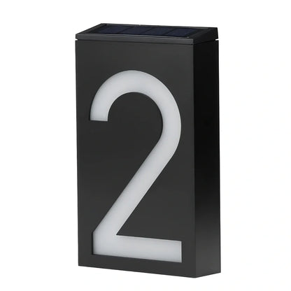 Solar powered house number with LED illumination showing waterproof construction and concealed mounting