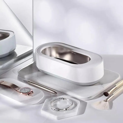 White portable ultrasonic cleaner with stainless steel tank for cleaning jewellery and glasses