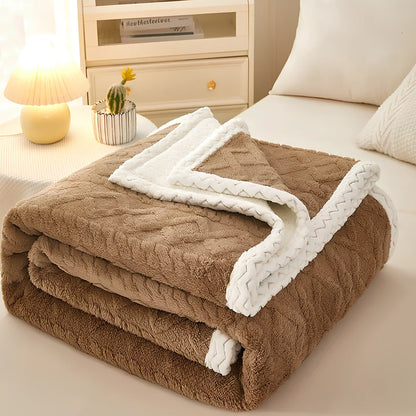 Double-thickened coral fleece sofa blanket in caramel colour showing dense texture and substantial thickness