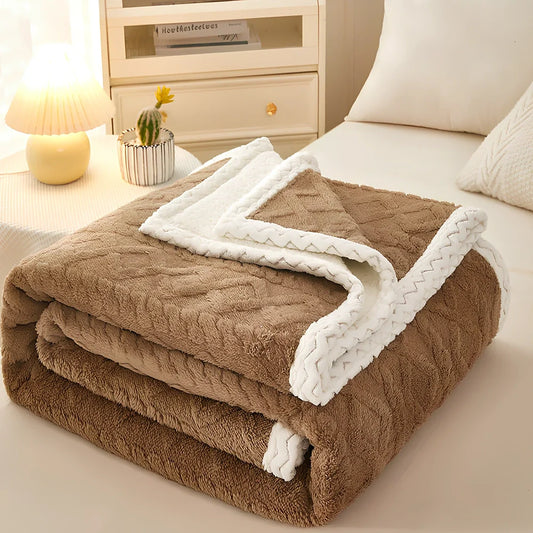 Double-thickened coral fleece sofa blanket in caramel colour showing dense texture and substantial thickness