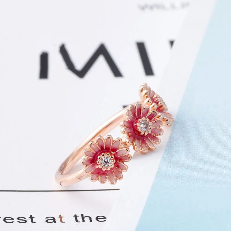 Pink daisy ring in 925 sterling silver with micro-inlay gemstones, five sizes 50mm to 58mm.