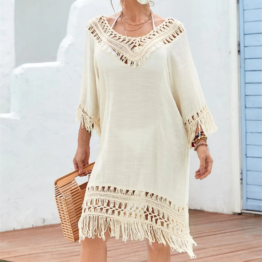Apricot crocheted knitted patchwork beach dress with mid-length skirt and half sleeves on hanger