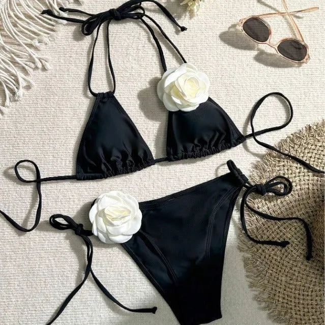 Black women's bikini set with 3D flower lace detailing and an adjustable drawstring waist.