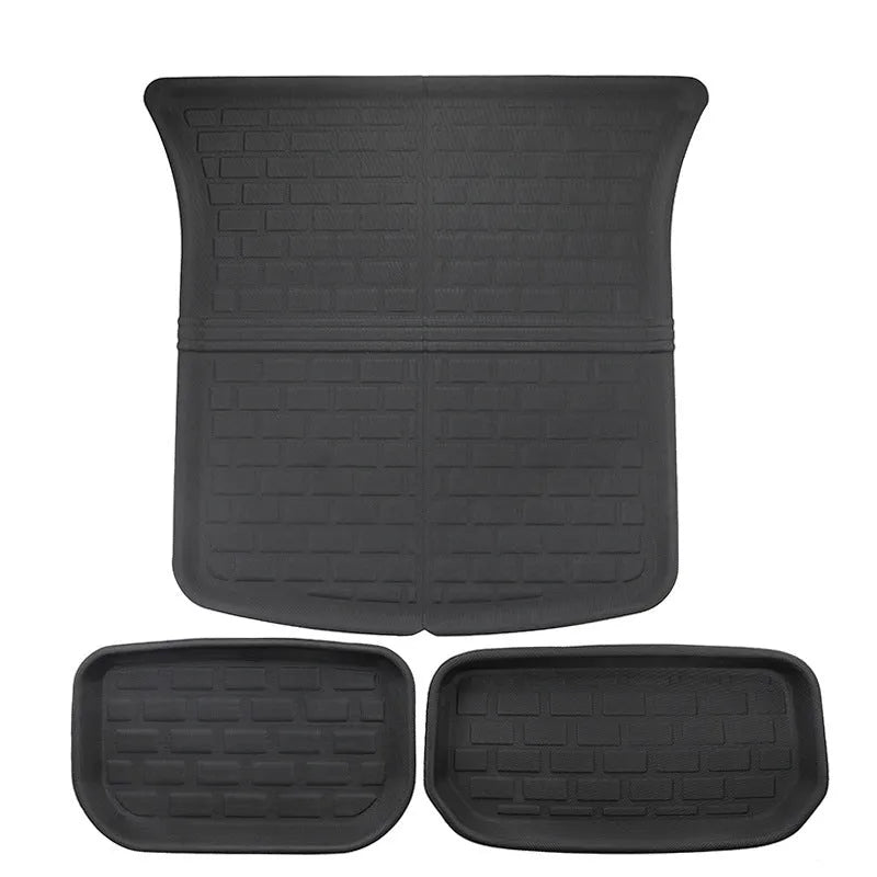 Tesla Model Y TPR floor mat set showing foot mats, storage box mats, and tailbox mats