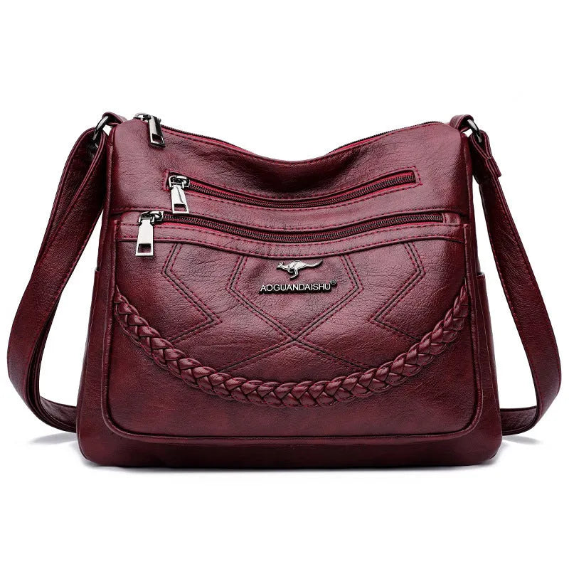 Soft leather fashion shoulder bag in horizontal square design with multiple internal pockets