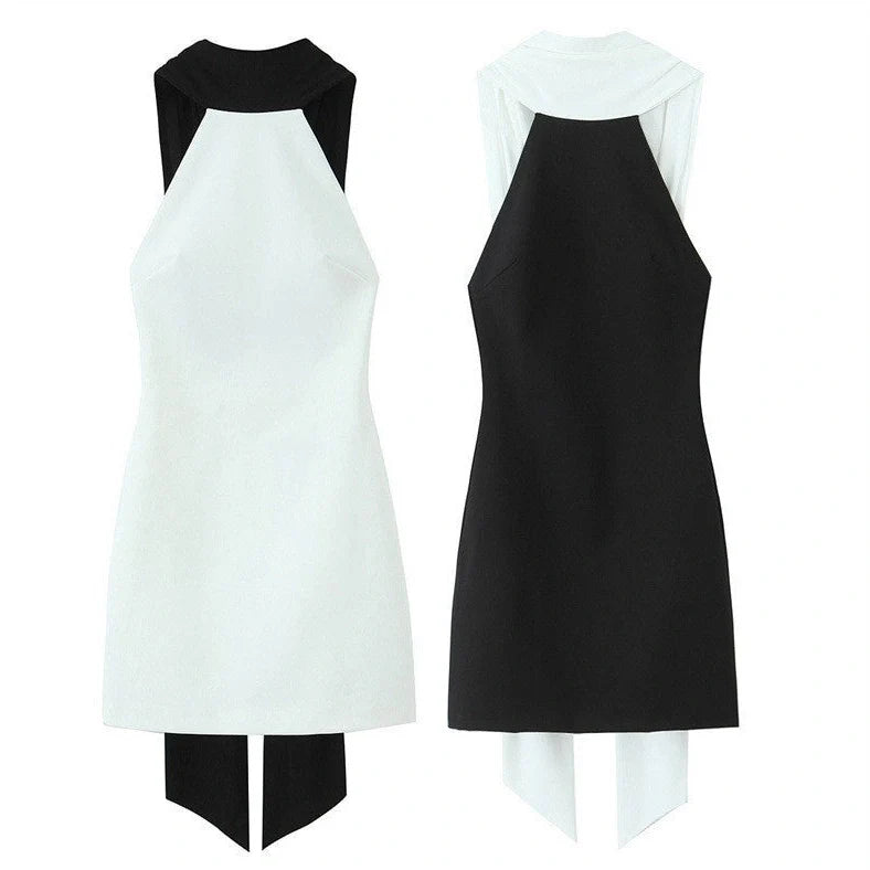 Slim-fitting black patchwork halter dress with asymmetric skirt and high waist detail