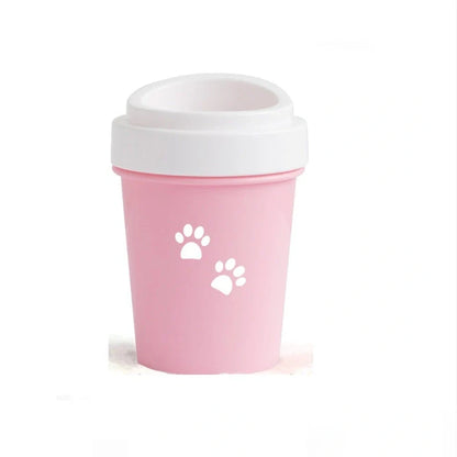 Silicone dog paw cleaner cup in blue, green, or pink with soft bristles for washing muddy paws