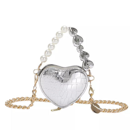 Mini heart-shaped pearls handbag in silver with adjustable chain strap