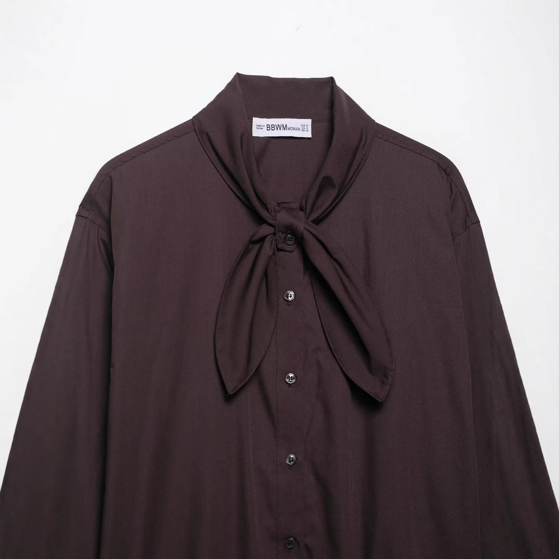 Brown women's loose fit poplin shirt with cardigan-style opening and bow tie detail