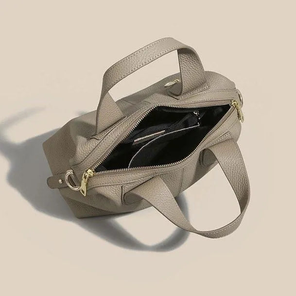 Women's genuine leather cross-body shoulder bag in horizontal square design with multiple internal compartments