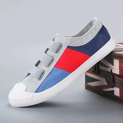 Men's canvas casual sneakers with elastic band fastening and vulcanised rubber sole in multiple colour options
