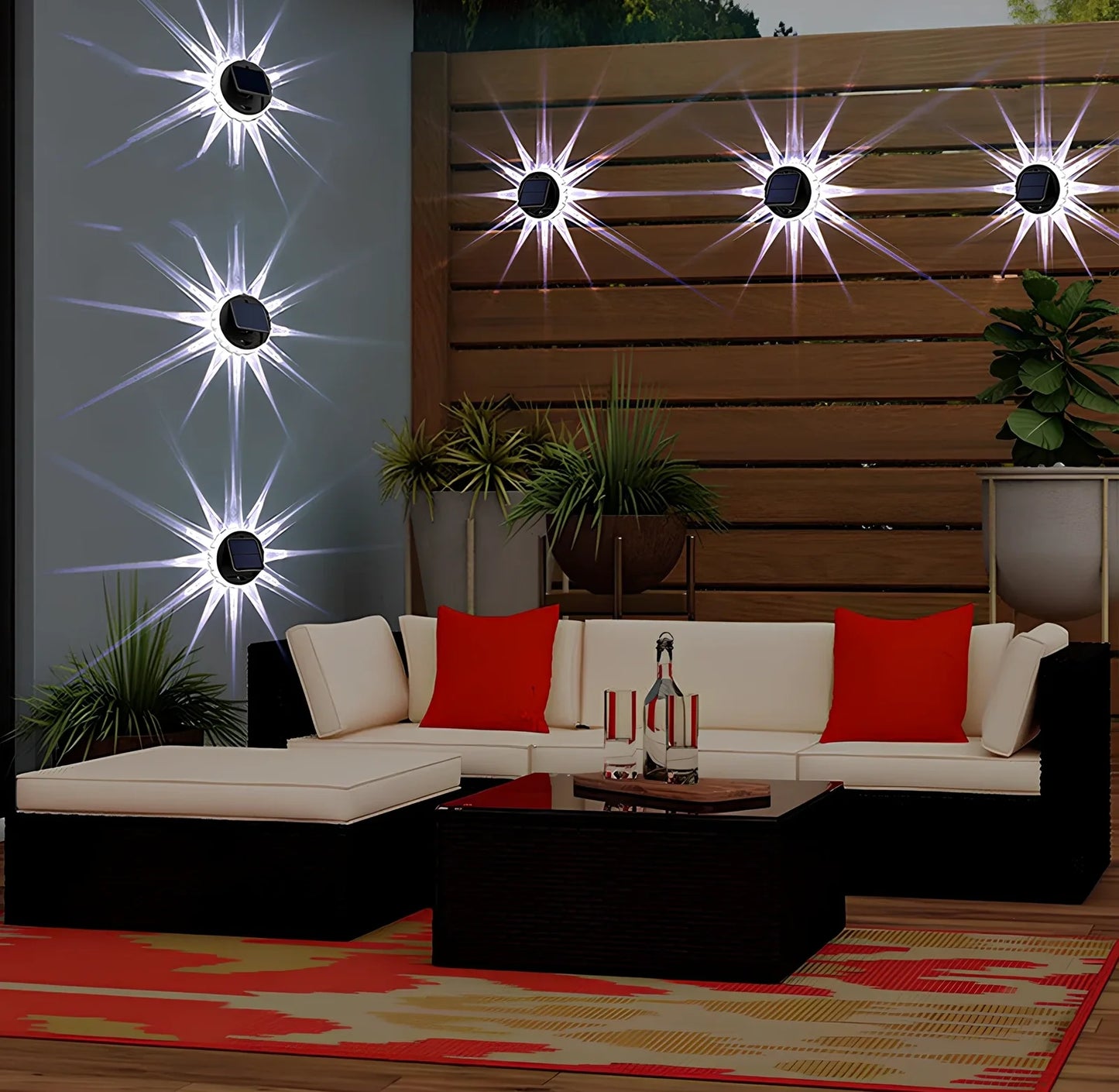 Round solar garden wall light with 9 LED lights mounted on wooden fence