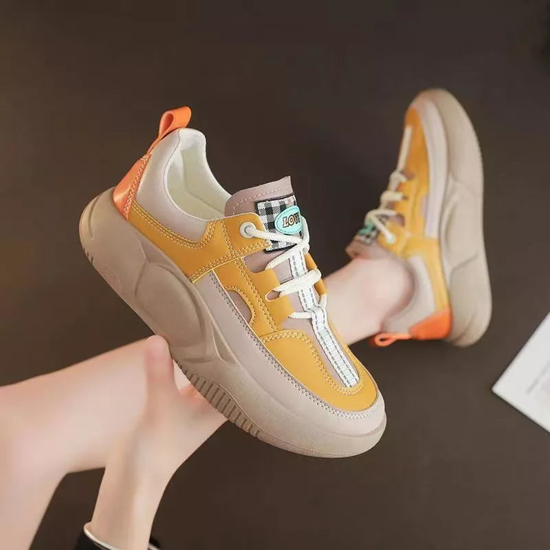 Women's thick-soled sneakers with leather stitching detail in beige and green