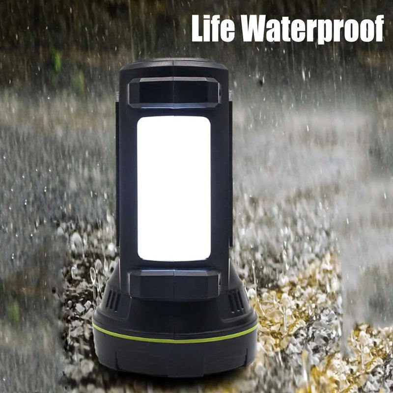 Rechargeable super bright LED flashlight with 500m+ beam range, 10-hour runtime from 6000mAh battery, ABS plastic construction, waterproof rating for rain use, functions as table light or handheld torch in green colour with USB charging