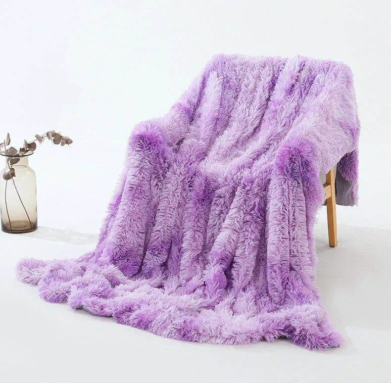 Soft, plush sherpa throw blanket in a variety of colors and sizes, perfect for cozy relaxation on the sofa or bed
