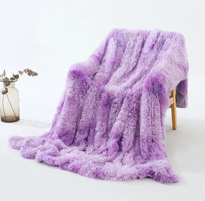 Soft, plush sherpa throw blanket in a variety of colors and sizes, perfect for cozy relaxation on the sofa or bed