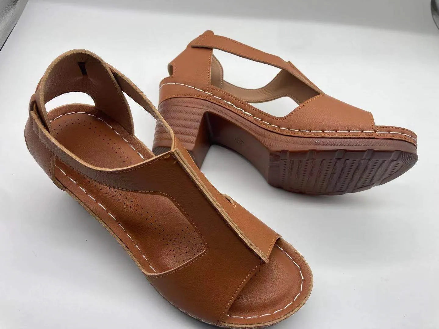 Plus size women's peep toe wedge sandals with adjustable buckle strap in light brown colour