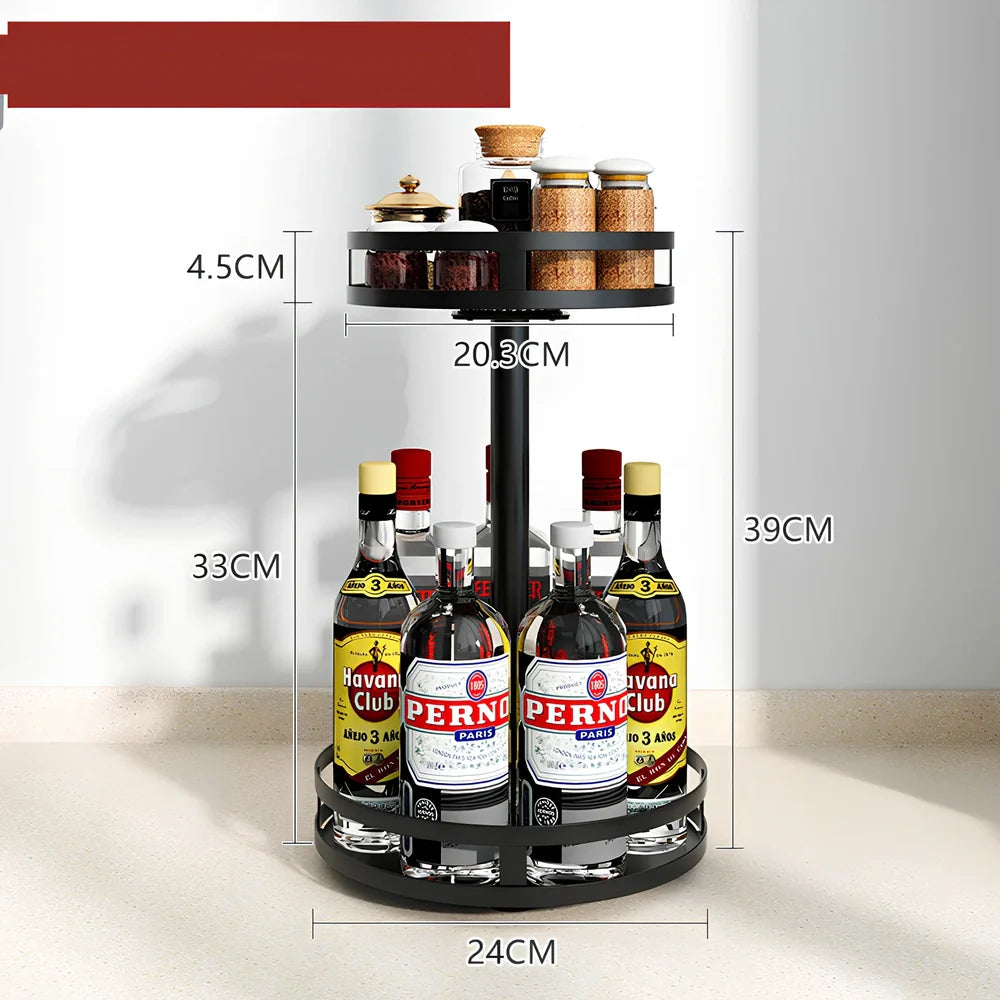 Stainless steel rotating spice rack with two tiers holding 12 bottles on kitchen countertop
