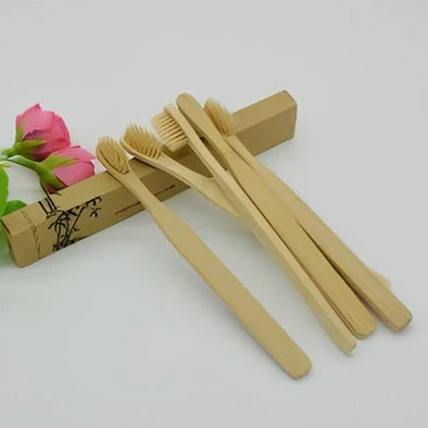 Organic bamboo toothbrush with 17.5cm ergonomic handle and charcoal-infused bristles for sustainable dental care