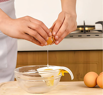 White ABS plastic egg separator with 10cm handle and 7.3cm bowl for yolk separation