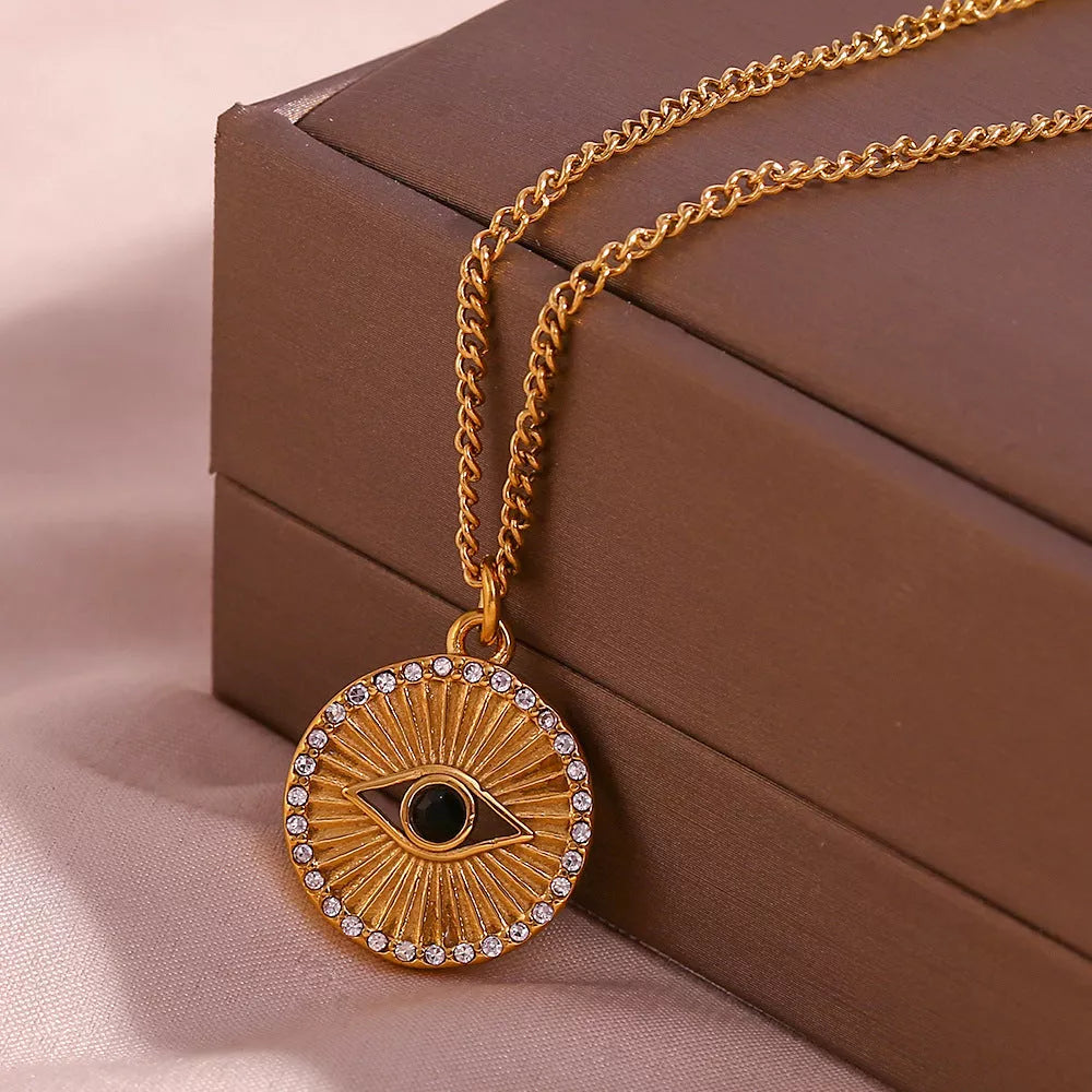 Minimalist black eyes stainless steel necklace with gold rhinestone pendant