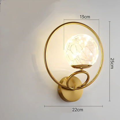 Crystal bedside lamp with stainless steel base and transparent shade providing soft illumination