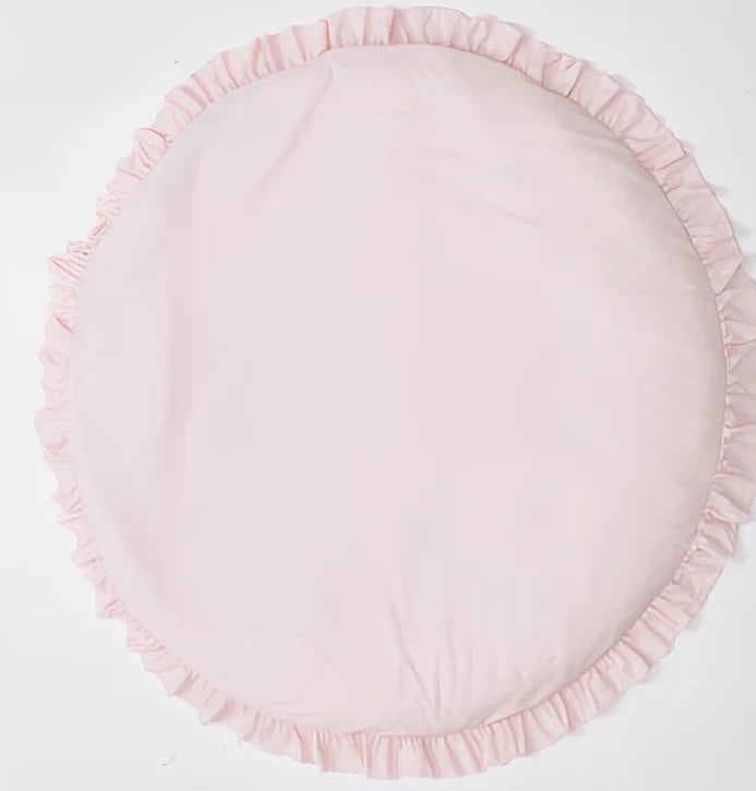 Circular baby play mat with lace border showing 2cm thickness measurement