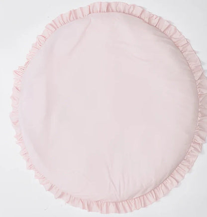 Circular baby play mat with lace border showing 2cm thickness measurement