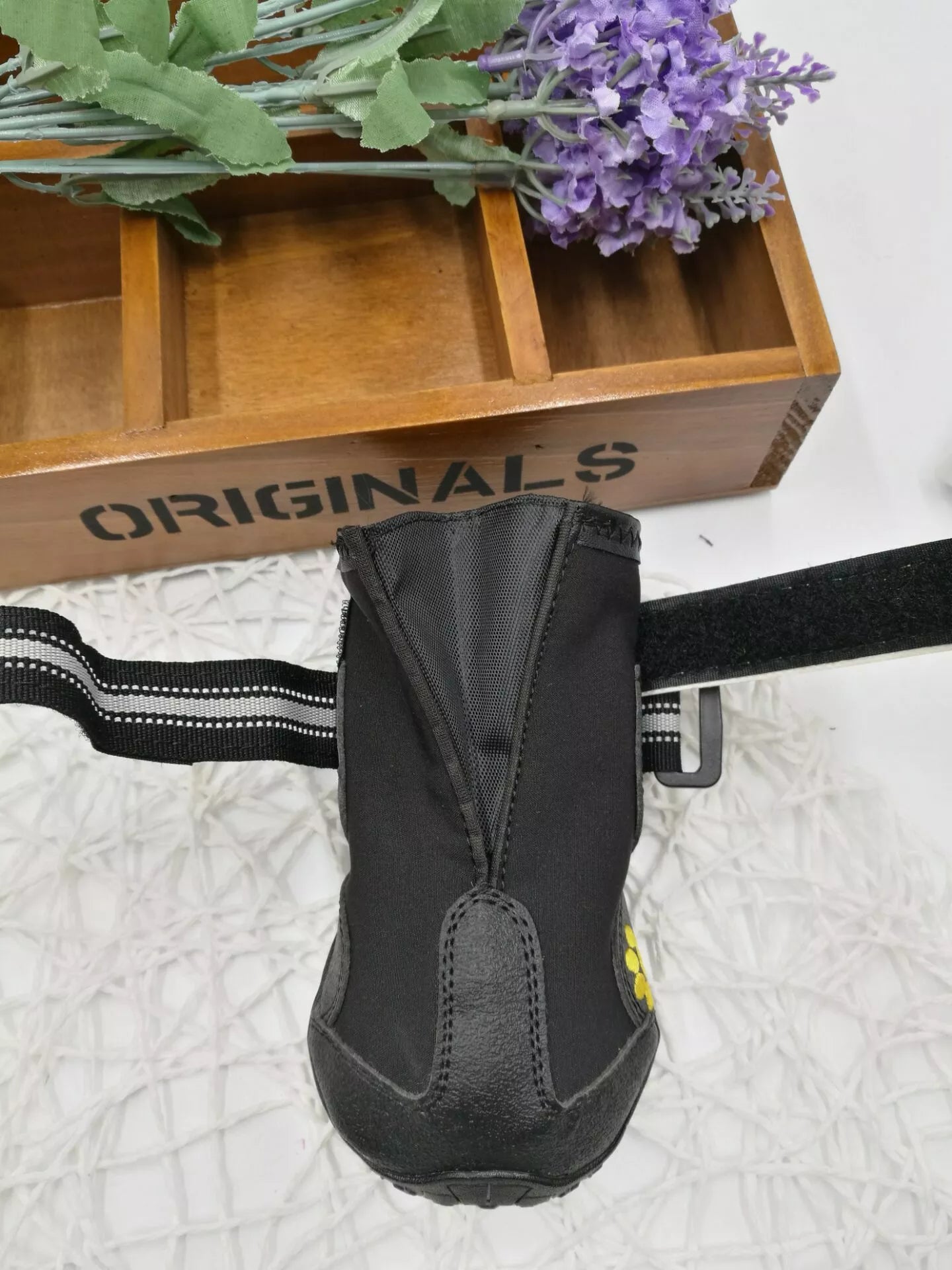 Black waterproof dog shoes with non-slip soles and adjustable fuzzy belts