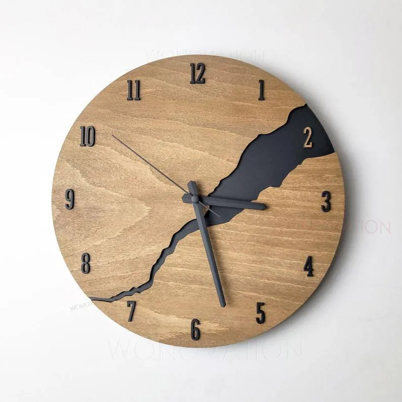 Modern wooden wall clock with crack finish surface in circular design showing time markers