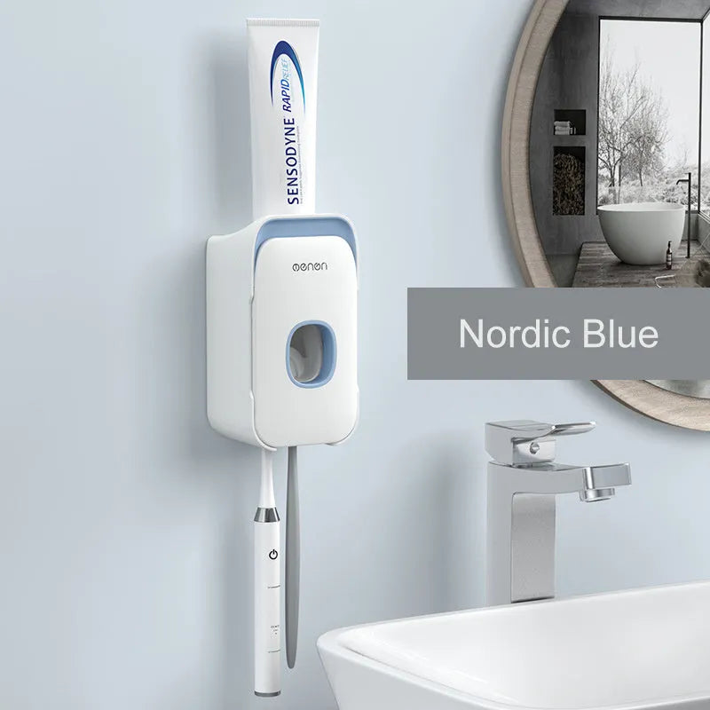 Automatic toothpaste dispenser with motion sensor and LED light in blue, grey or pink colours mounted on bathroom wall