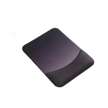 Square cloth mouse pad with grey silicone gel wrist rest and hand pillow on a wooden desk.
