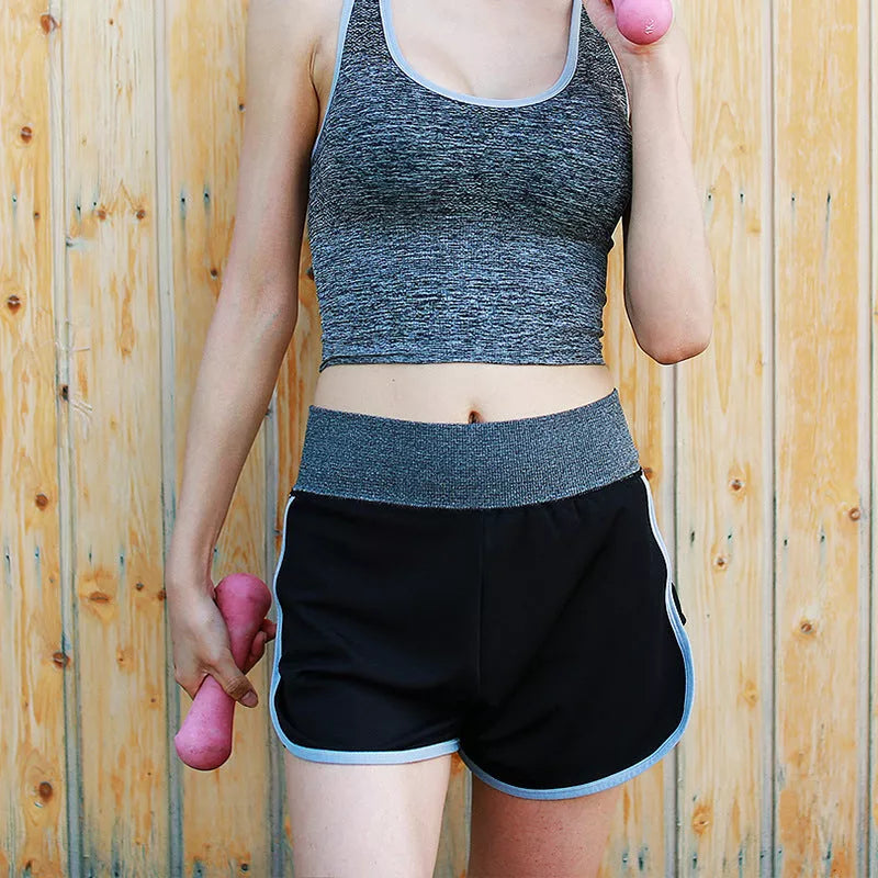 Women's yoga sports shorts in rose red, grey, and green for fitness and running