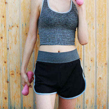 Women's yoga sports shorts in rose red, grey, and green for fitness and running